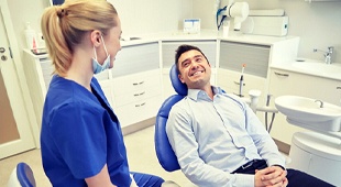 man smiling in dental chair