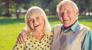 smiling elderly couple