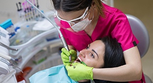 Dental patient receiving a checkup and cleaning