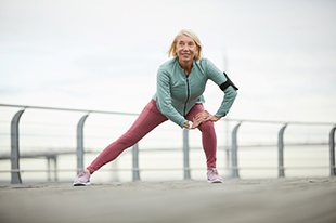 Patient in Deer Park with dental implants exercising
