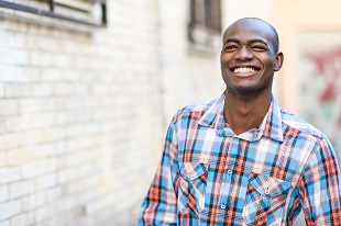 an attractive man smiling 