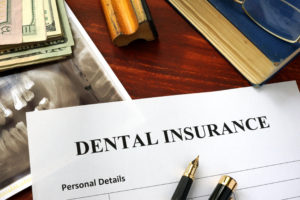 Dental insurance forms on desk