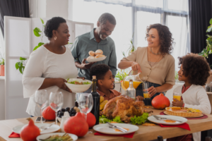 a family enjoying Thanksgiving dinner together 